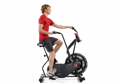 Man on Schwinn Airdyne AD6 exercise bike. 